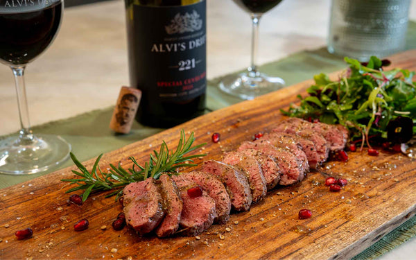 Springbok medallions with mustard sauce and Alvi’s Drift 221 Special Cuvée Red